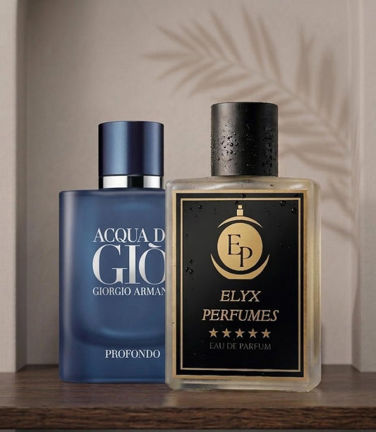 Two perfume bottles, one blue and one black with gold accents, on a wooden surface.