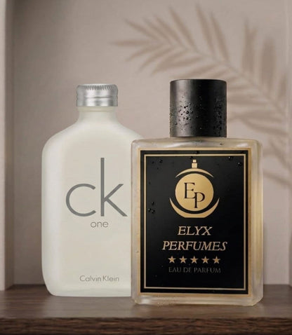 Two perfume bottles, one Calvin Klein and one Elyx Perfumes, on a wooden surface with a neutral background.